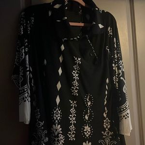 Beautiful dress, NEVER WORN; black & white.